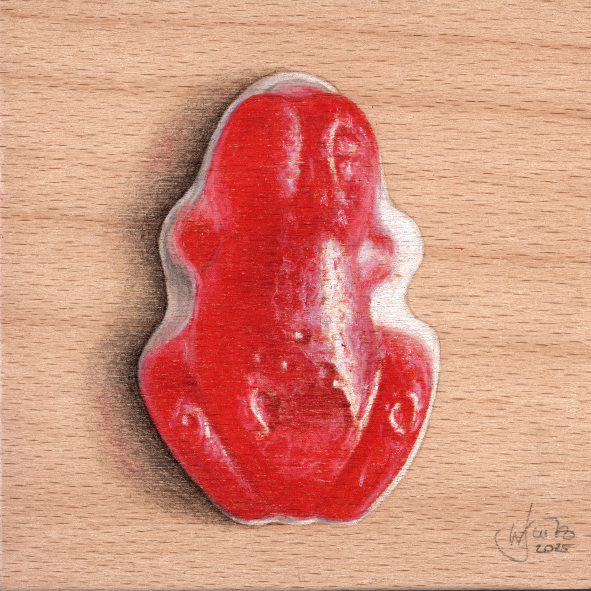 Gummi Frosch in Rot auf Holz gezeichnet